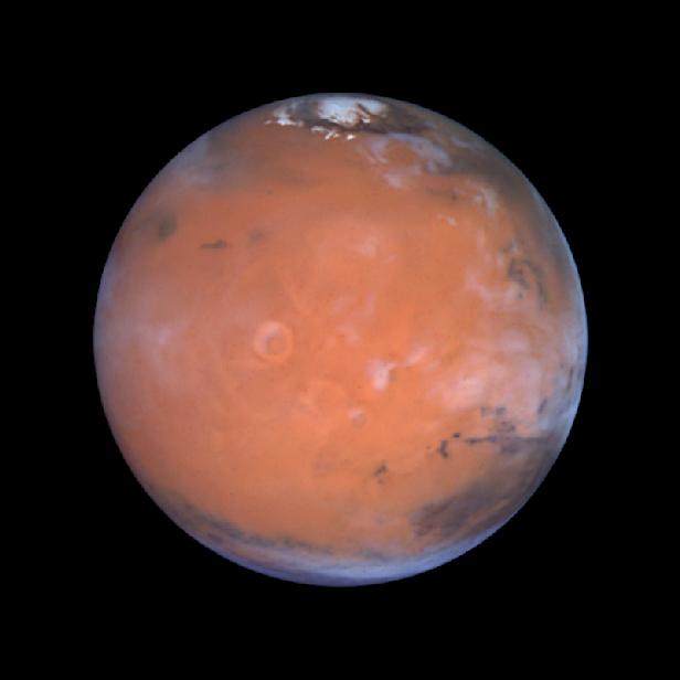 A Closer Hubble Encounter With Mars -Tharsis
